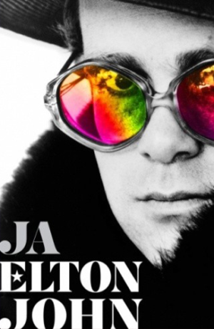 Okładka ksiażki "Ja, Elton John" (w tle portret czarno biały artysty w kolorowych okularach (symbol kreatywności i barwnego życia)